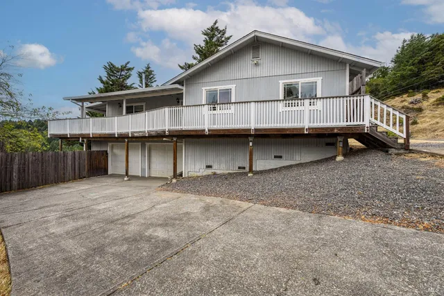 a view of house with outdoor space