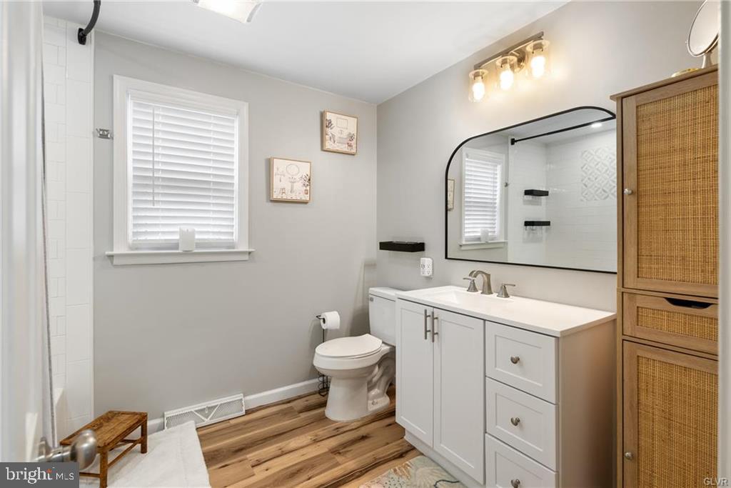 2051 Reading Avenue Reading, PA 19609 - Photo 12 of 45 a bathroom with a toilet sink and mirror