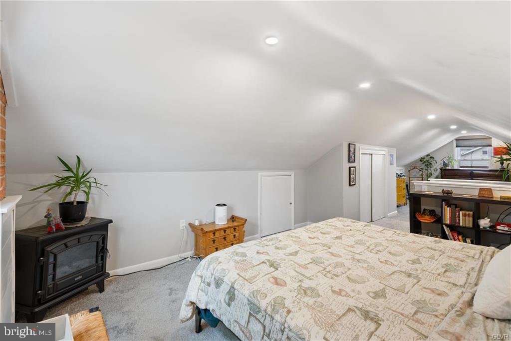2051 Reading Avenue Reading, PA 19609 - Photo 22 of 45 a bedroom with a bed and a flat screen tv