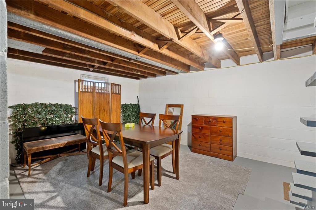 2051 Reading Avenue Reading, PA 19609 - Photo 31 of 45 a dining room with a wooden table and chairs