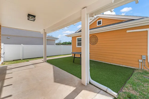 a house view with a garden space