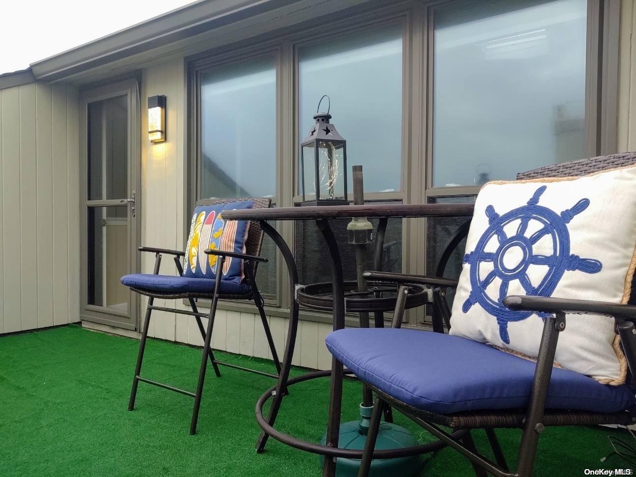 813 Shore Road Long Beach, NY 11561 - Photo 17 of 33 a bedroom with furniture and a mirror