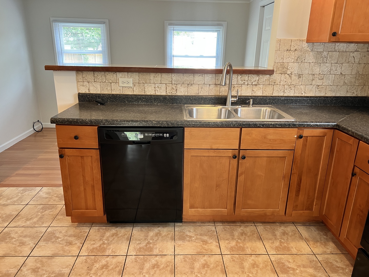 611 North Main Street Lombard, IL 60148 - Photo 11 of 17 a view of a kitchen with wooden cabinets