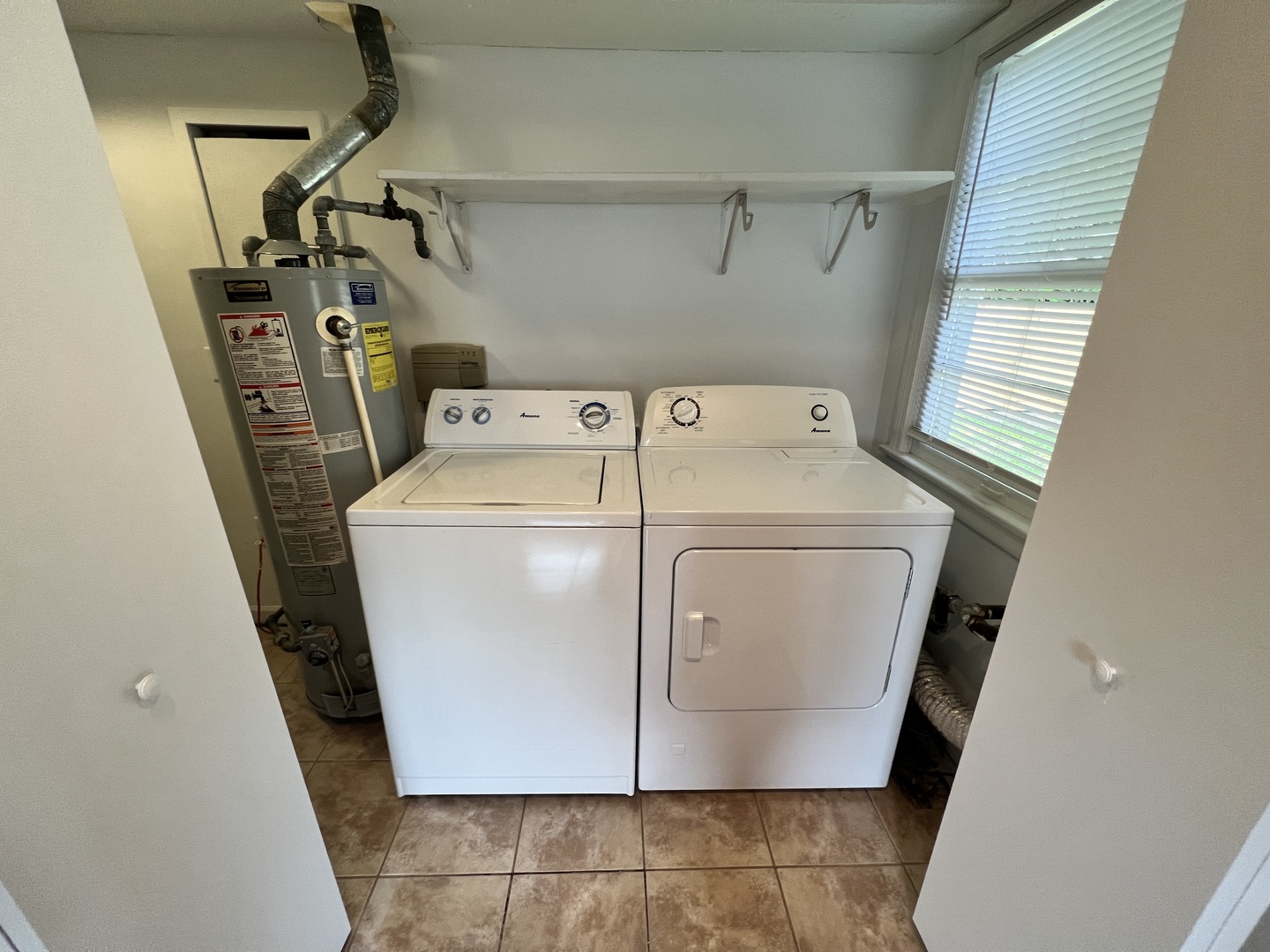 611 North Main Street Lombard, IL 60148 - Photo 17 of 17 a utility room with dryer and washer