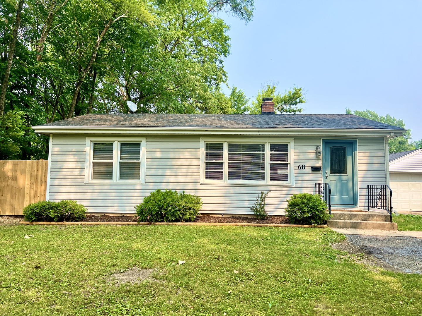 611 North Main Street Lombard, IL 60148 - Photo 2 of 17 a front view of a house with a yard