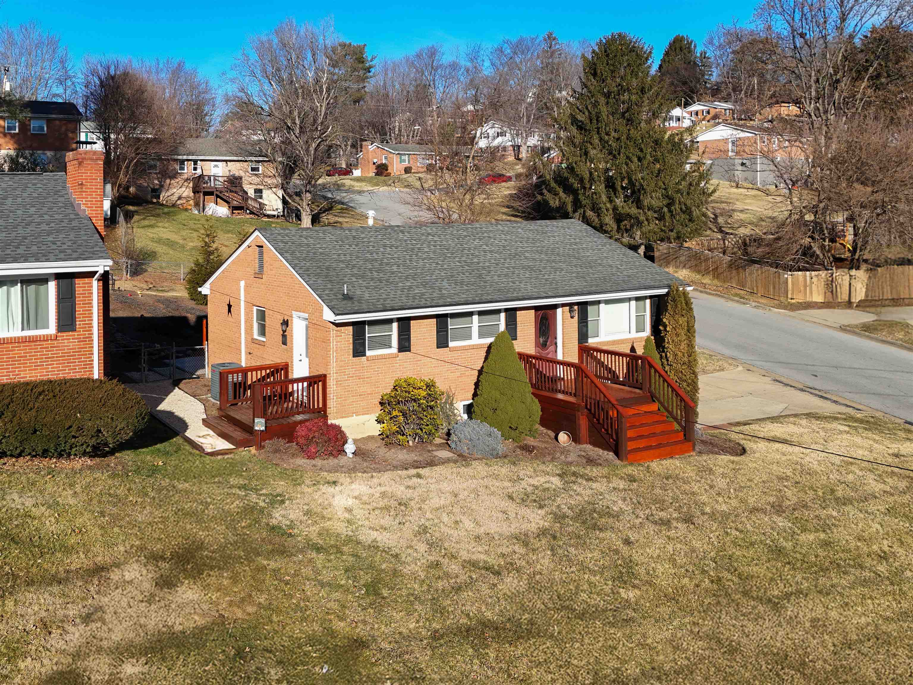 a view of a house with yard porch and furniture