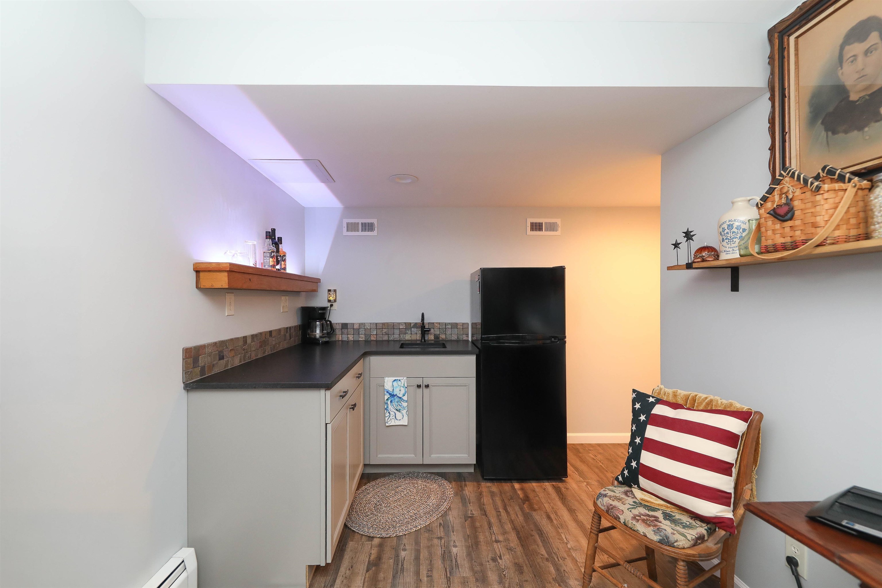 1198 Spaulding Street Staunton, VA 24401 - Photo 25 of 48 a kitchen with stainless steel appliances granite countertop a sink stove and refrigerator