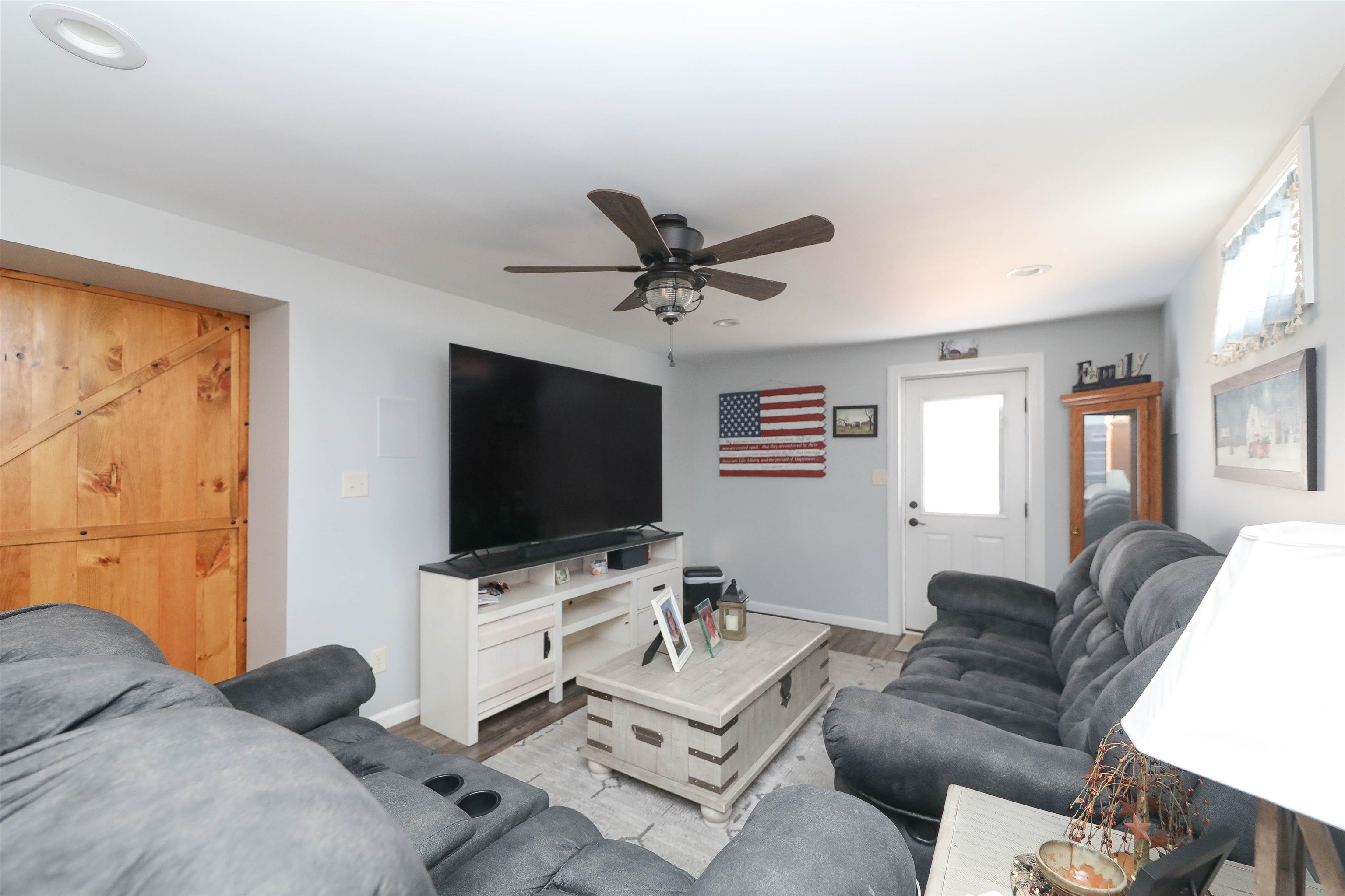 1198 Spaulding Street Staunton, VA 24401 - Photo 30 of 48 a living room with furniture and a flat screen tv