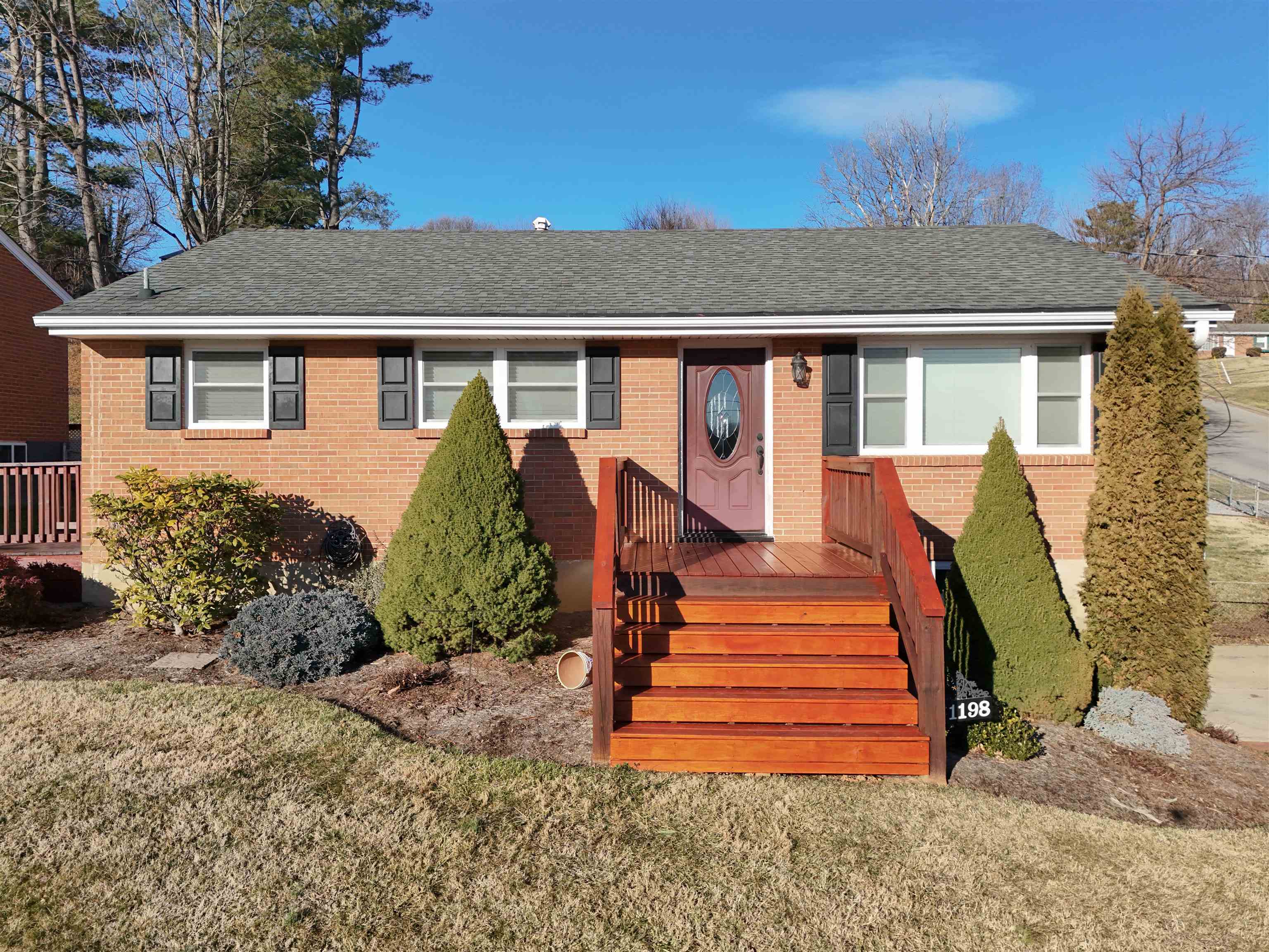 1198 Spaulding Street Staunton, VA 24401 - Photo 3 of 48 a front view of a house with a yard
