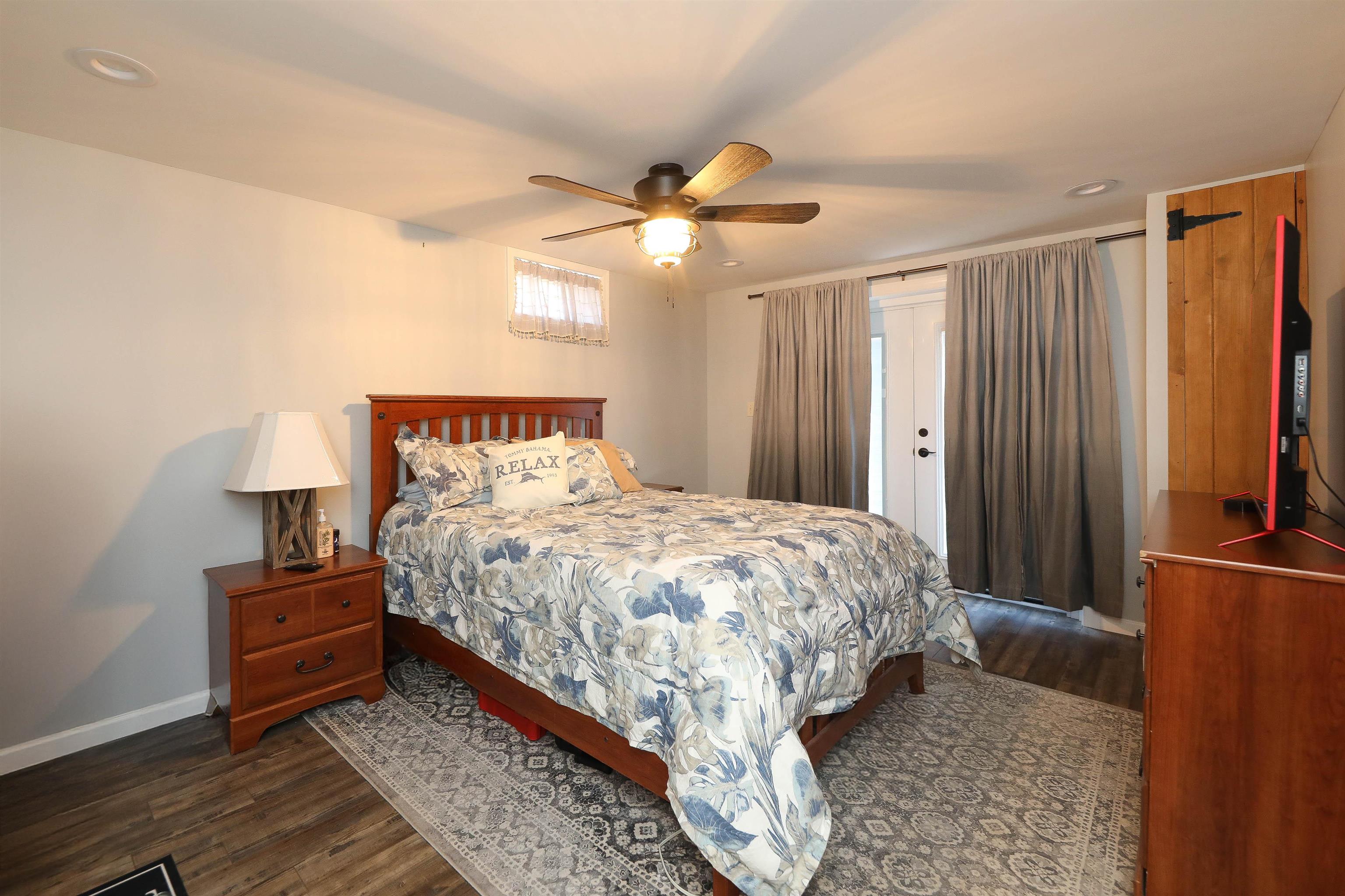 1198 Spaulding Street Staunton, VA 24401 - Photo 32 of 48 a bedroom with a bed and a chandelier