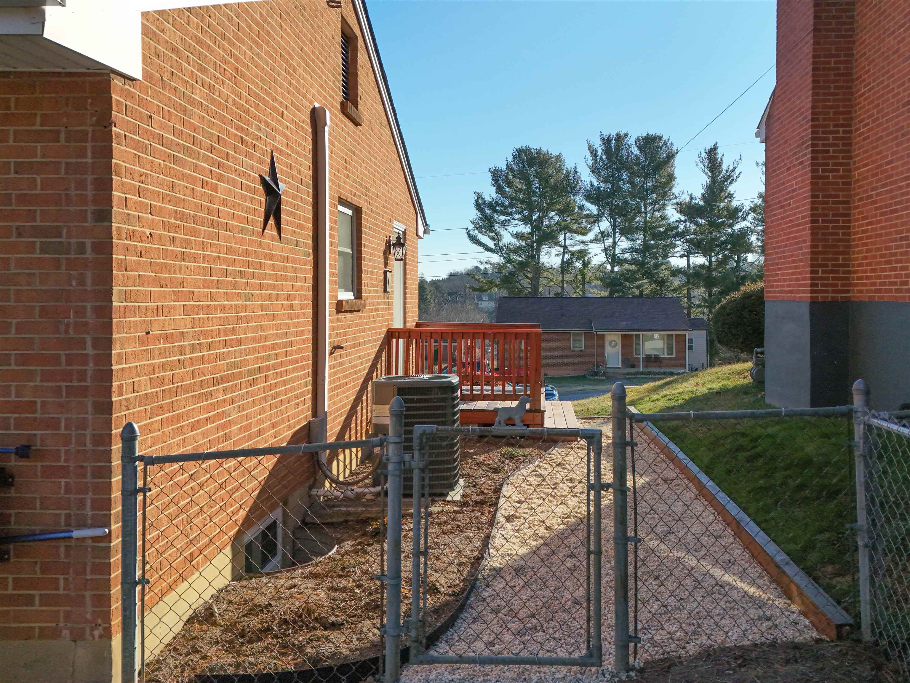 1198 Spaulding Street Staunton, VA 24401 - Photo 46 of 48 a view of a house with backyard and trees