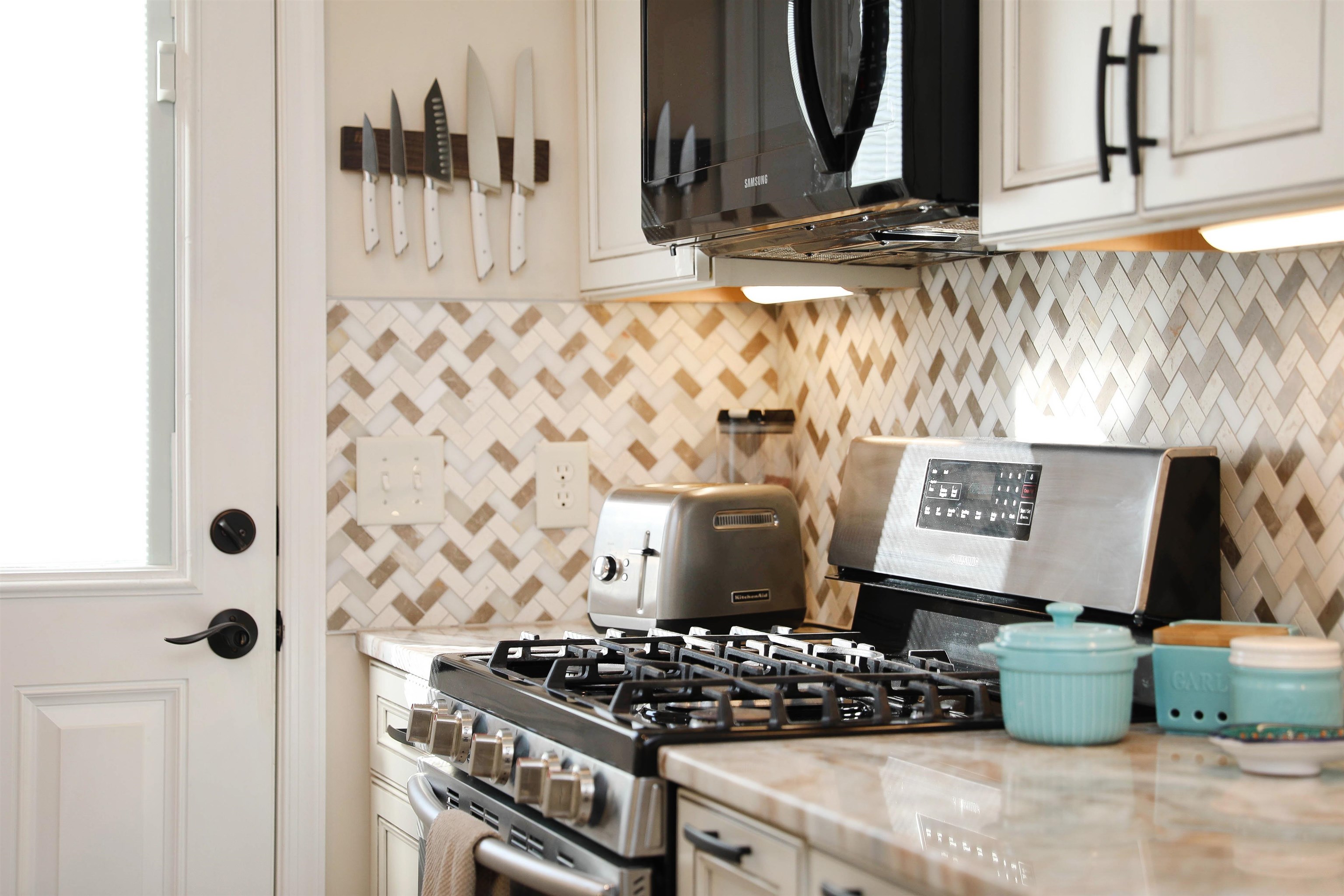 1198 Spaulding Street Staunton, VA 24401 - Photo 6 of 48 a kitchen with a stove and a cabinets