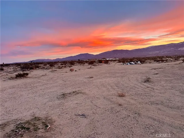 a view of an outdoor space and mountain view