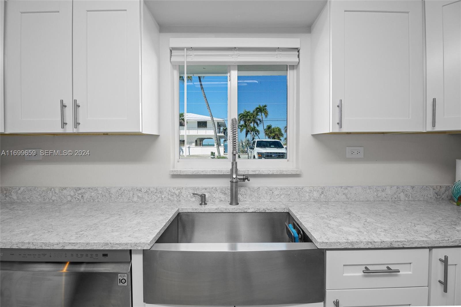7951 Gulfstream Boulevard Marathon, FL 33050 - Photo 14 of 60 a kitchen with a sink and cabinets