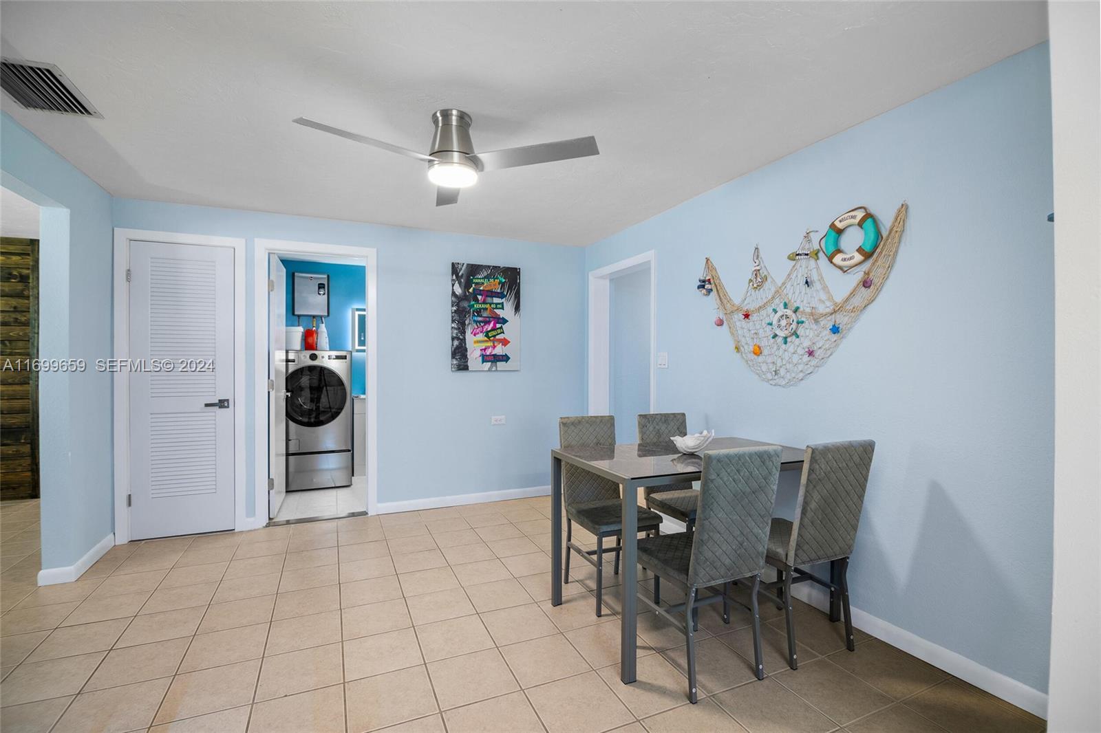 7951 Gulfstream Boulevard Marathon, FL 33050 - Photo 18 of 60 a view of a dining room with furniture and wooden floor