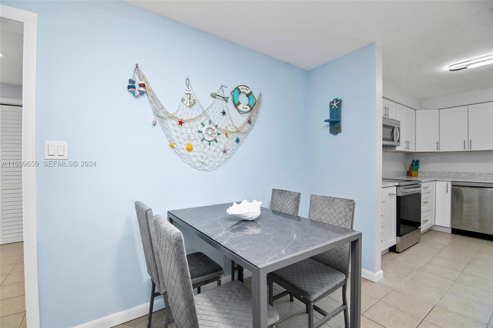 7951 Gulfstream Boulevard Marathon, FL 33050 - Photo 20 of 60 a view of a dining room with furniture