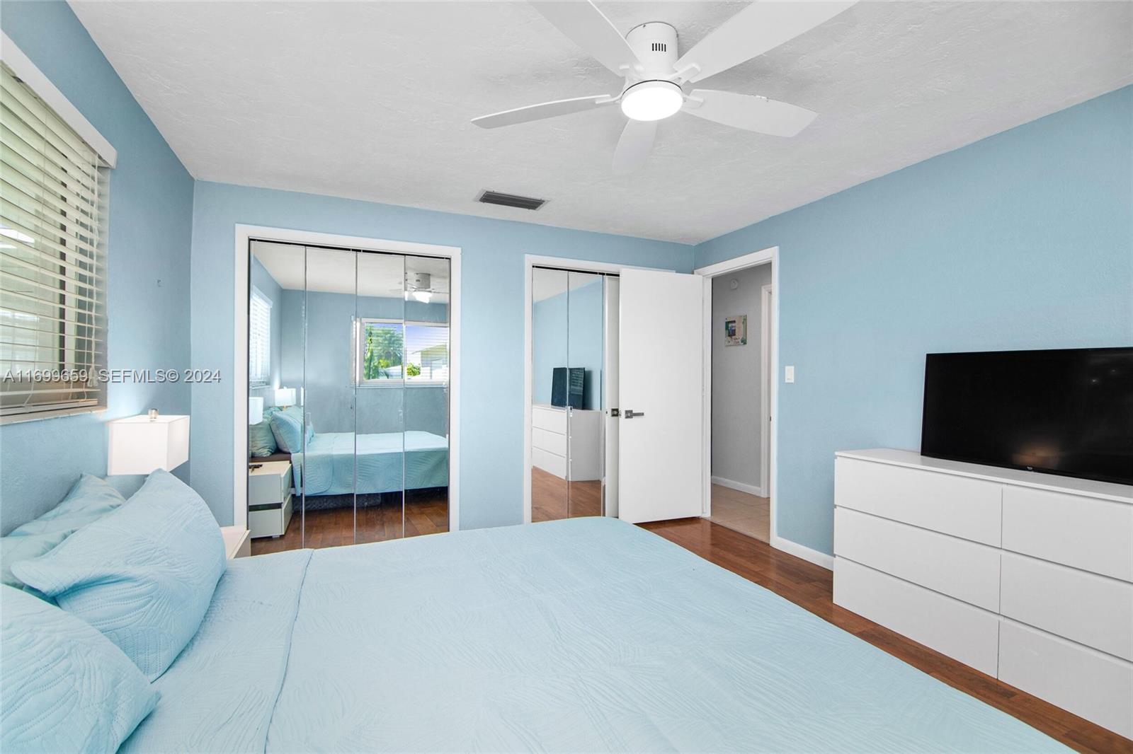 7951 Gulfstream Boulevard Marathon, FL 33050 - Photo 23 of 60 a bedroom with furniture and a flat screen tv