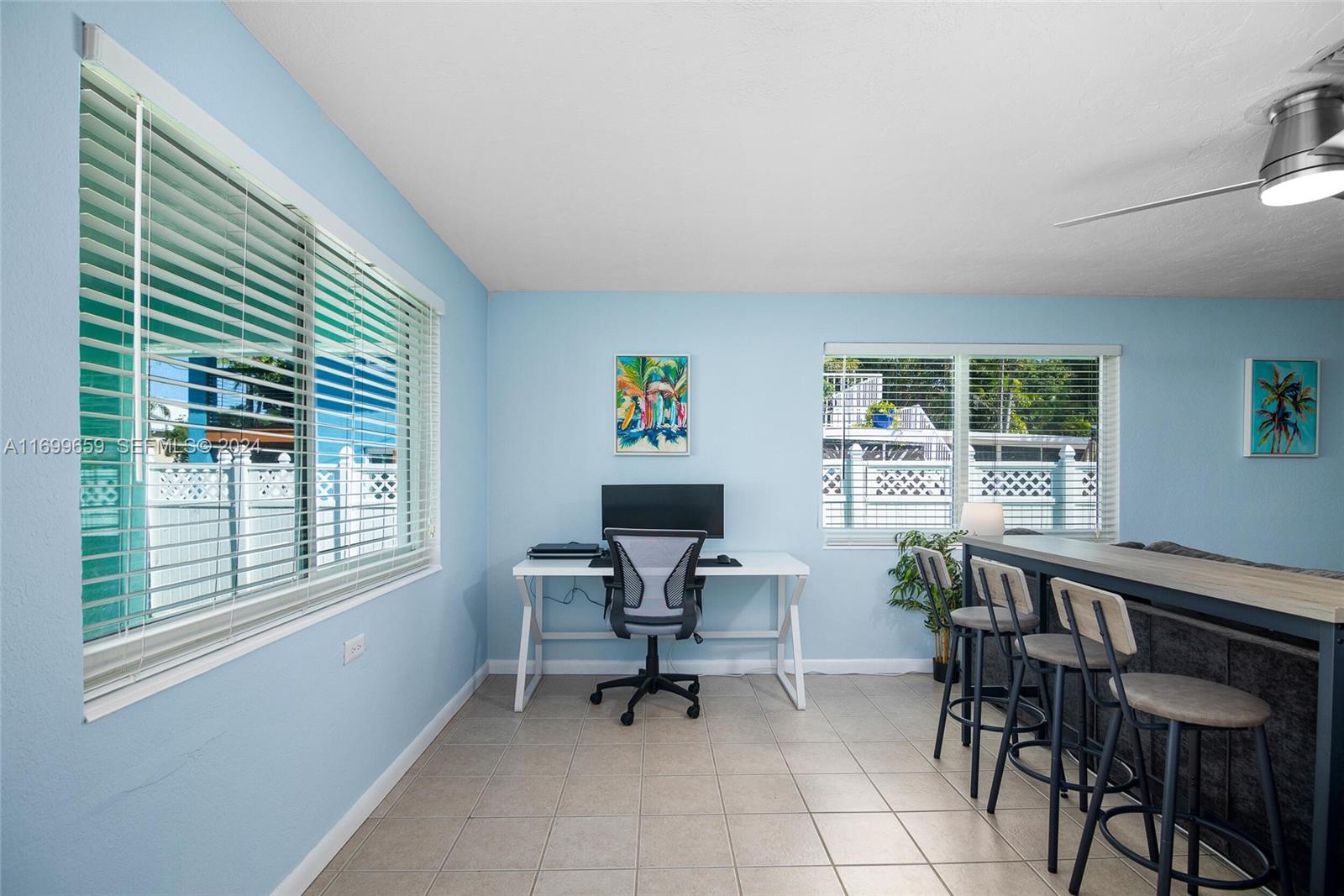 7951 Gulfstream Boulevard Marathon, FL 33050 - Photo 3 of 60 a view of a workspace with furniture and a window