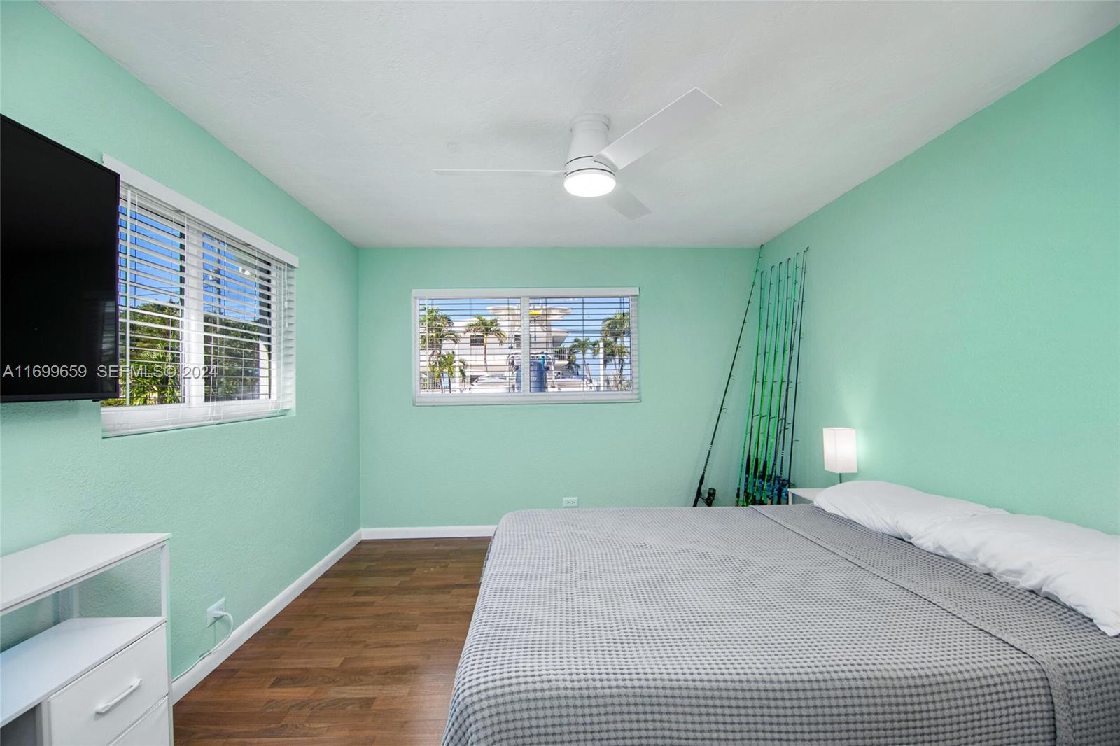 7951 Gulfstream Boulevard Marathon, FL 33050 - Photo 31 of 60 a bedroom with a bed and a window