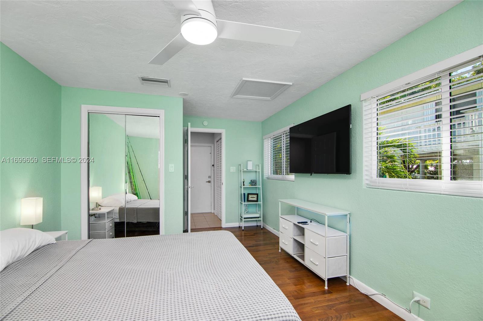 7951 Gulfstream Boulevard Marathon, FL 33050 - Photo 34 of 60 a bedroom with furniture and a flat screen tv
