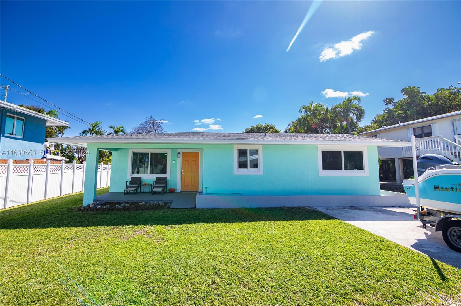 7951 Gulfstream Boulevard Marathon, FL 33050 - Photo 36 of 60 a view of a house with a backyard porch and sitting area