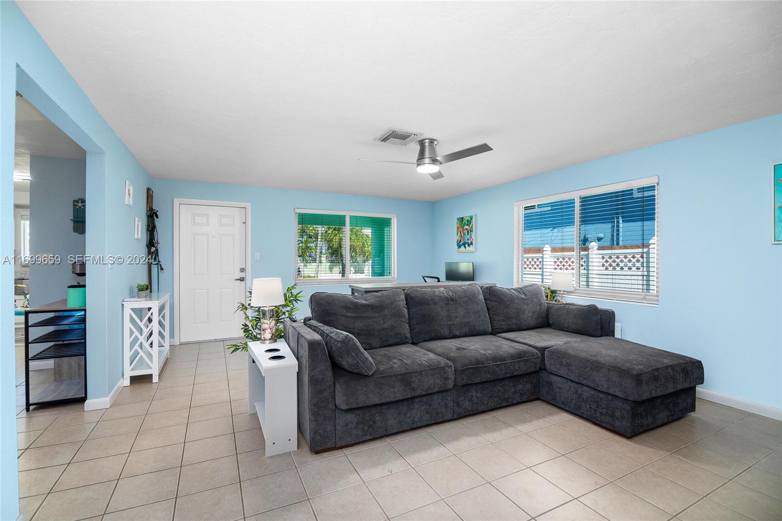 7951 Gulfstream Boulevard Marathon, FL 33050 - Photo 4 of 60 a living room with furniture and a window