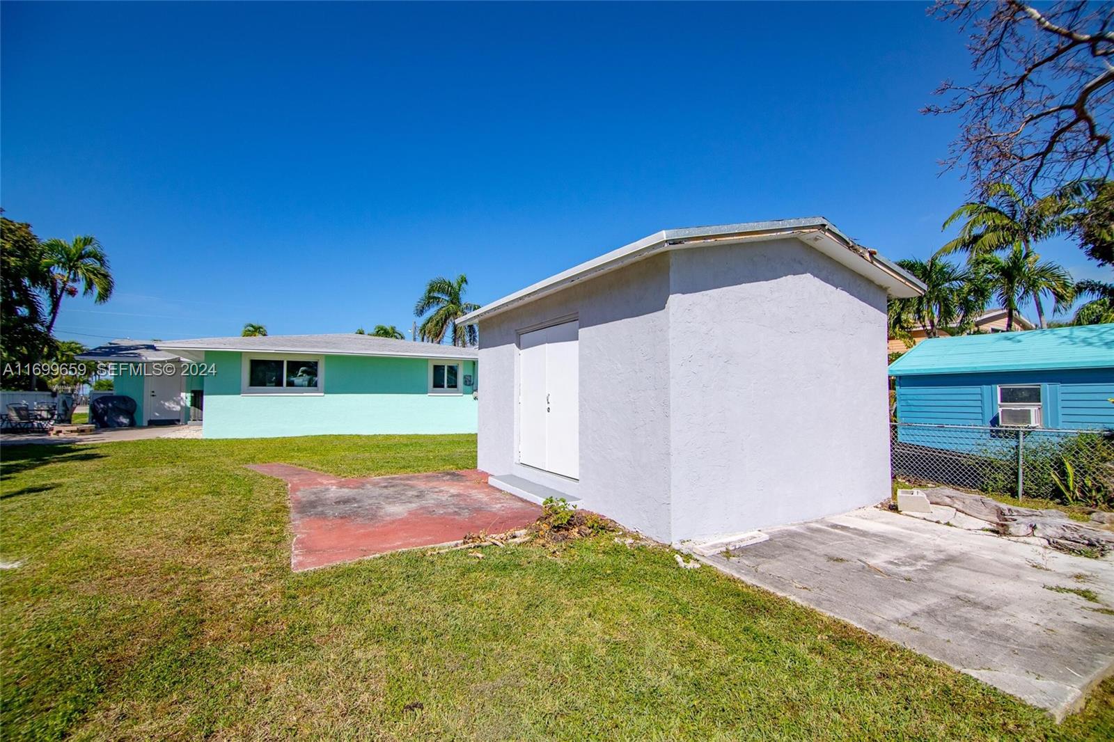 7951 Gulfstream Boulevard Marathon, FL 33050 - Photo 45 of 60 a front view of a house with a yard