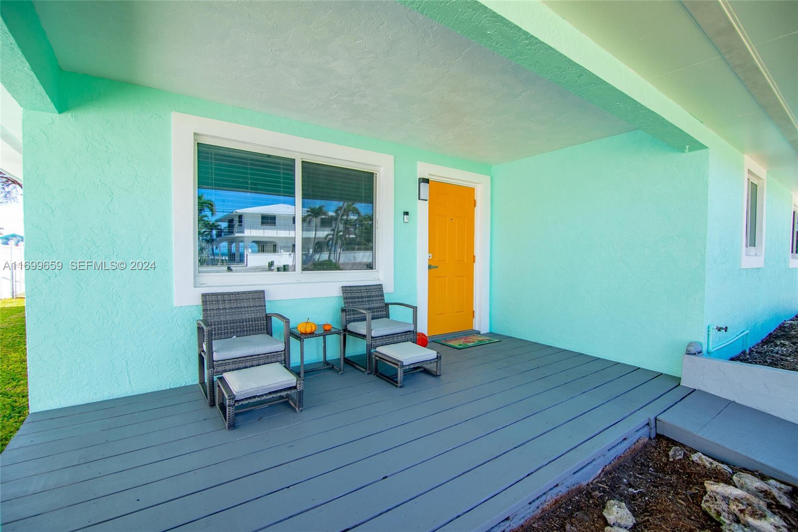 7951 Gulfstream Boulevard Marathon, FL 33050 - Photo 48 of 60 a view of a room with wooden floor and a table