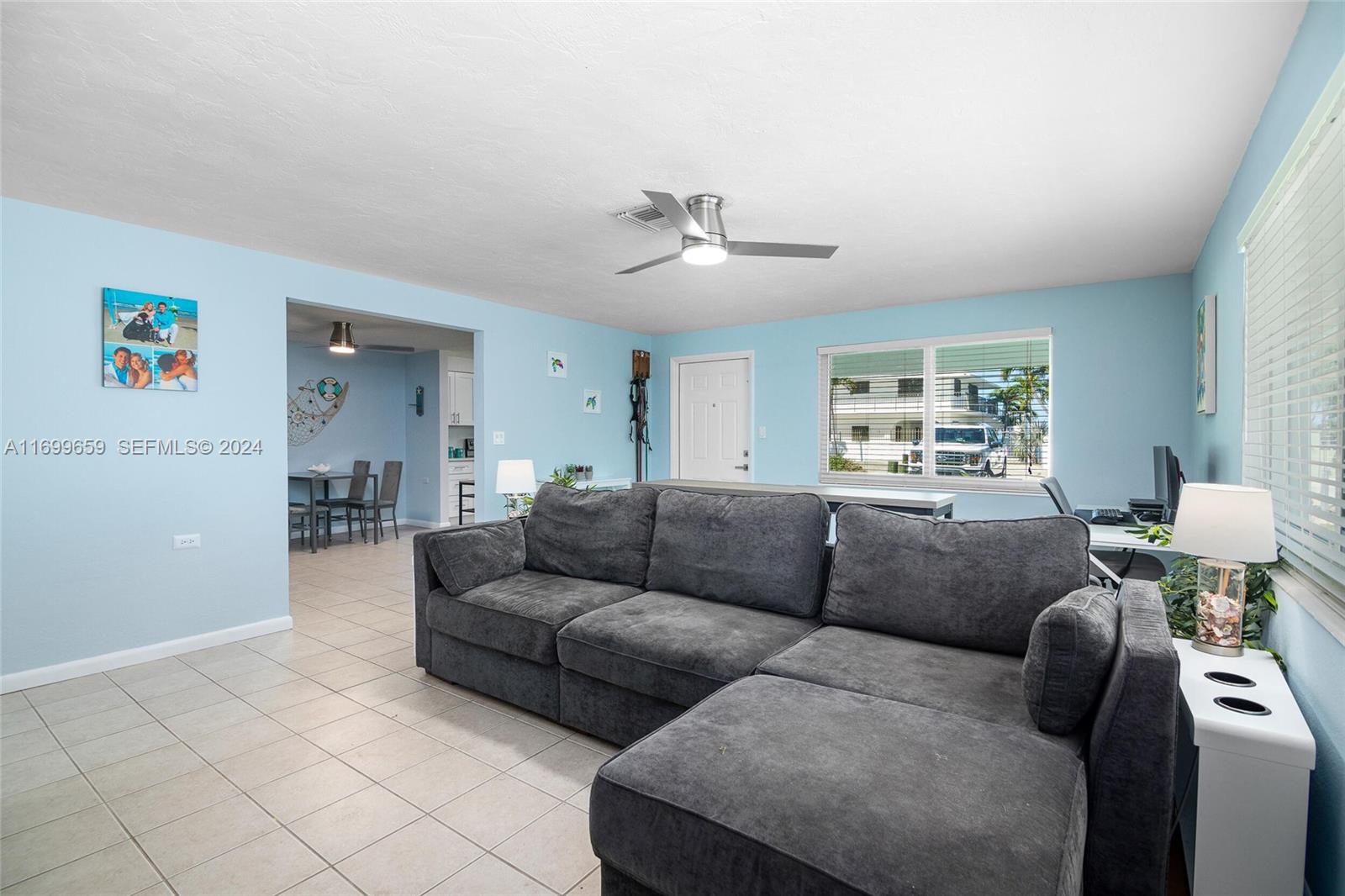 7951 Gulfstream Boulevard Marathon, FL 33050 - Photo 6 of 60 a living room with furniture and a window