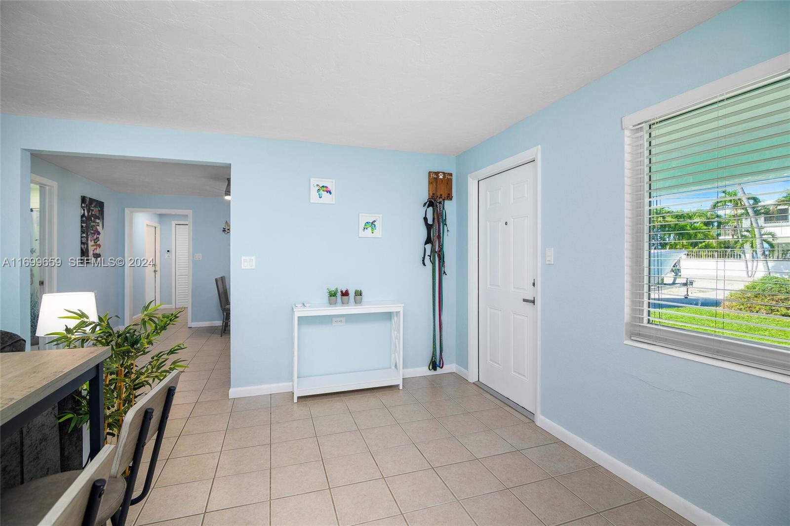 7951 Gulfstream Boulevard Marathon, FL 33050 - Photo 9 of 60 a view of room with window and hallway
