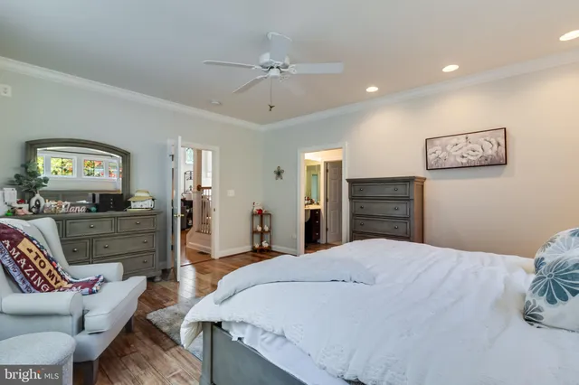 a bathroom with a sink vanity and a mirror