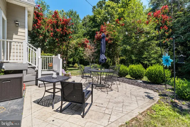 an aerial view of a house with a garden