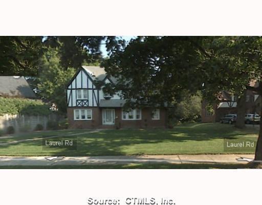 a view front of house with a yard