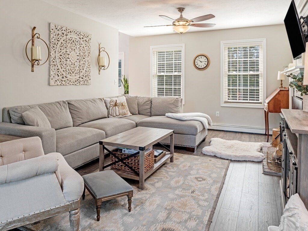447 Ashby Road Ashburnham, MA 01430 - Photo 11 of 37 a living room with furniture and a large window