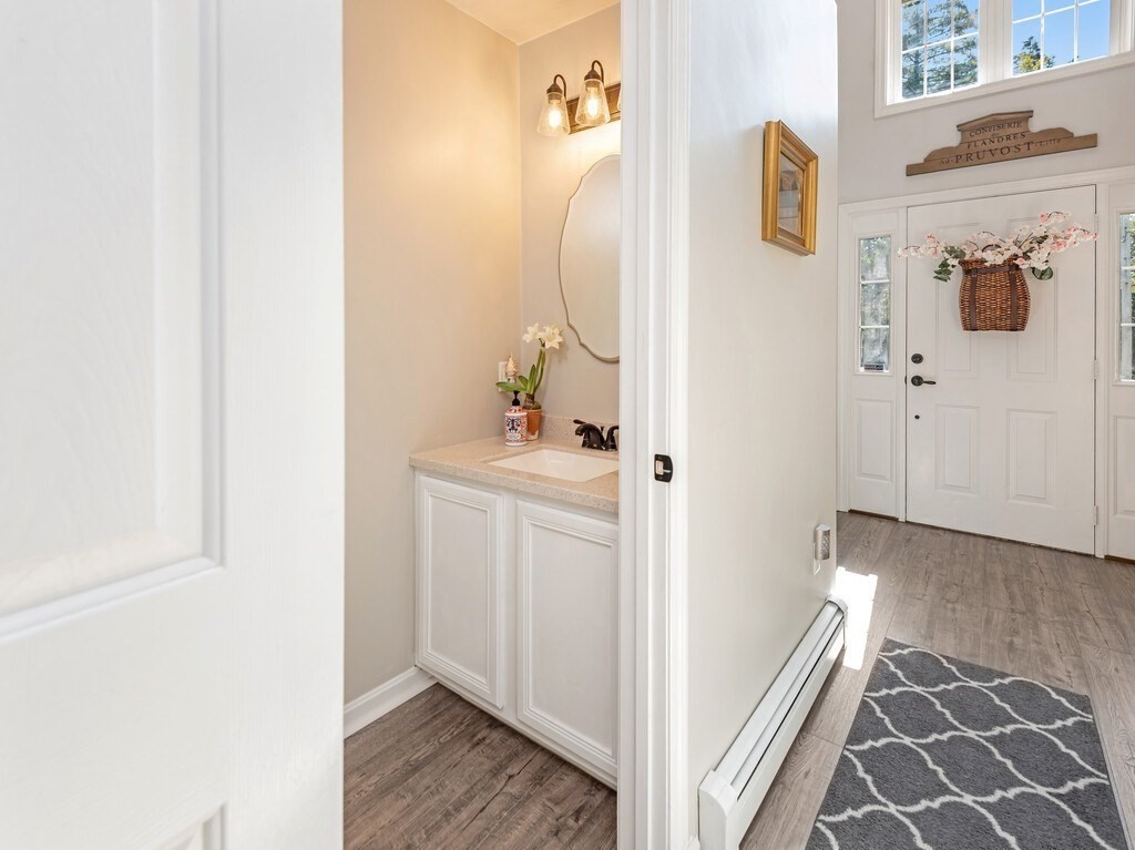 447 Ashby Road Ashburnham, MA 01430 - Photo 15 of 37 a bathroom with a sink and a mirror