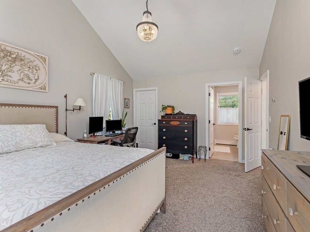 447 Ashby Road Ashburnham, MA 01430 - Photo 19 of 37 a living room with furniture and a flat screen tv