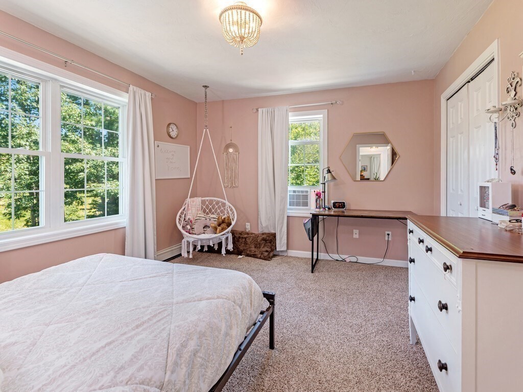 447 Ashby Road Ashburnham, MA 01430 - Photo 21 of 37 a bedroom with a bed and a large window