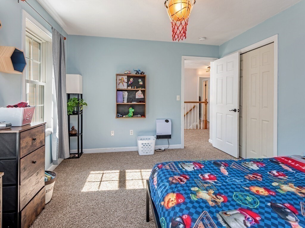 447 Ashby Road Ashburnham, MA 01430 - Photo 24 of 37 a bedroom with a bed and a dresser