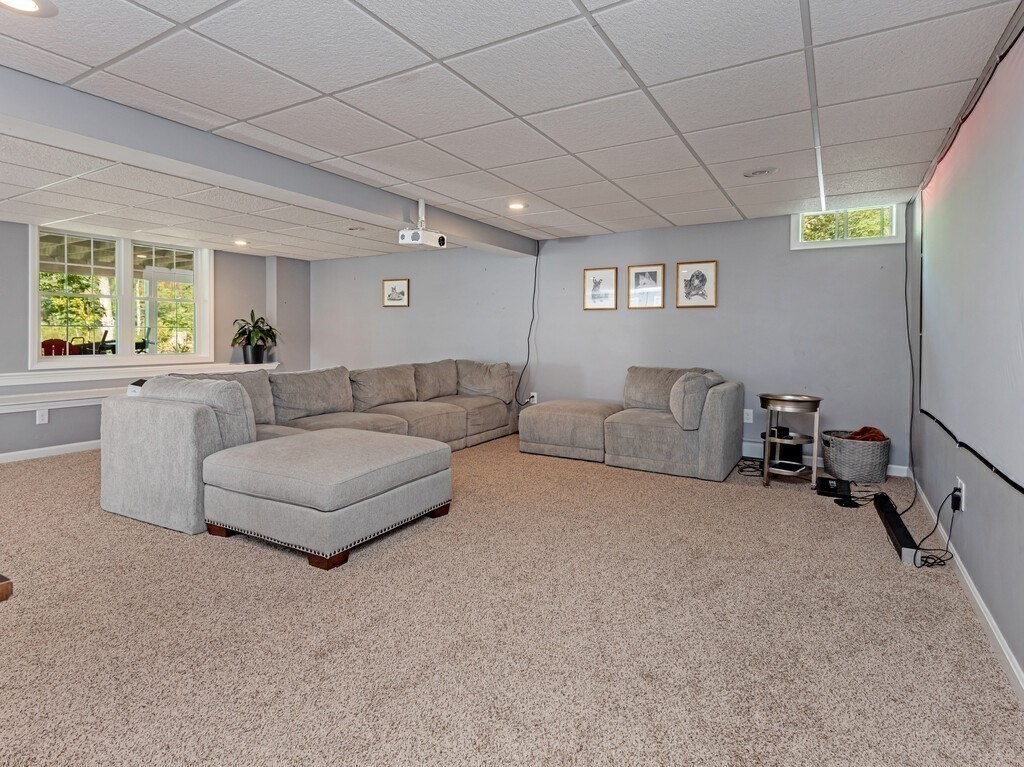 447 Ashby Road Ashburnham, MA 01430 - Photo 25 of 37 a living room with furniture and a large window