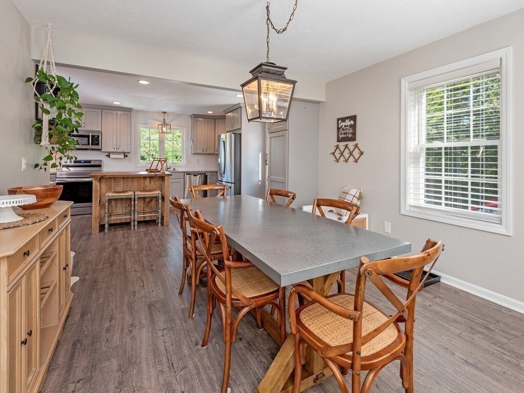 447 Ashby Road Ashburnham, MA 01430 - Photo 8 of 37 a dining room with furniture window wooden floor