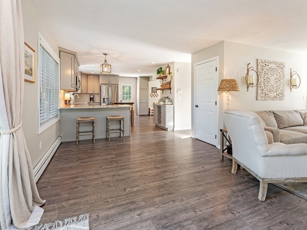 447 Ashby Road Ashburnham, MA 01430 - Photo 9 of 37 a living room with furniture and a wooden floor