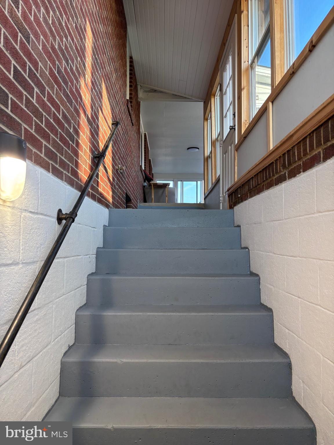 2483 Jericho Road Flint Hill, VA 22627 - Photo 13 of 18 a view of staircase with lots of frames on wall