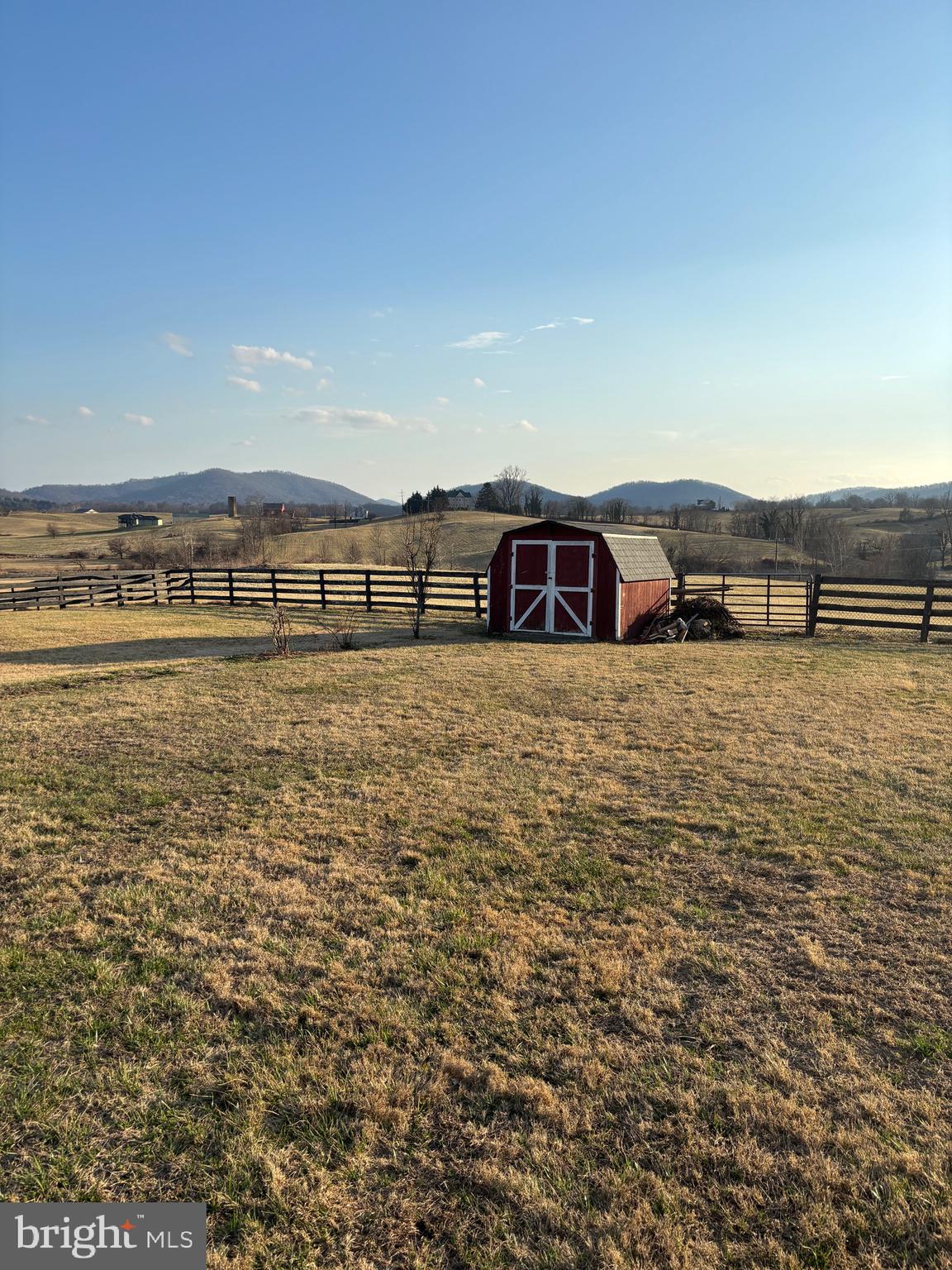 2483 Jericho Road Flint Hill, VA 22627 - Photo 16 of 18 a view of a terrace with lawn chairs and mountain view