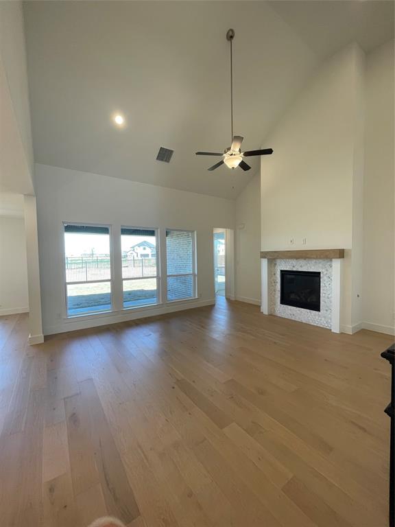 2124 Ten Mile Crk Road Celina, TX 75009 - Photo 10 of 30 a view of a livingroom with a fireplace and window