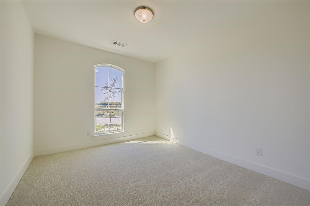 2124 Ten Mile Crk Road Celina, TX 75009 - Photo 19 of 30 an empty room with windows