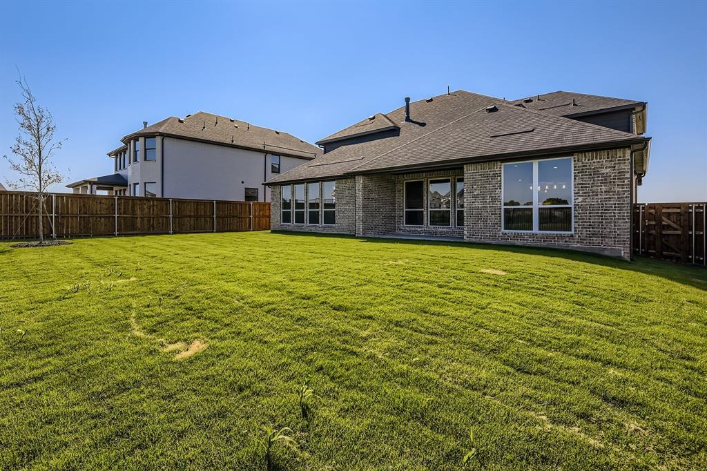 2124 Ten Mile Crk Road Celina, TX 75009 - Photo 27 of 30 a view of a house with a yard