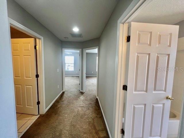 2749 Callaway Lane Kissimmee, FL 34744 - Photo 16 of 30 a view of hallway with windows