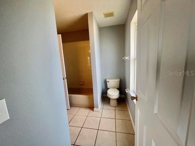 2749 Callaway Lane Kissimmee, FL 34744 - Photo 25 of 30 a bathroom with a sink and a toilet