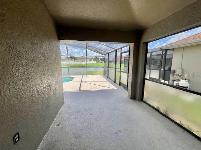2749 Callaway Lane Kissimmee, FL 34744 - Photo 28 of 30 wooden floor in an empty room with a large window