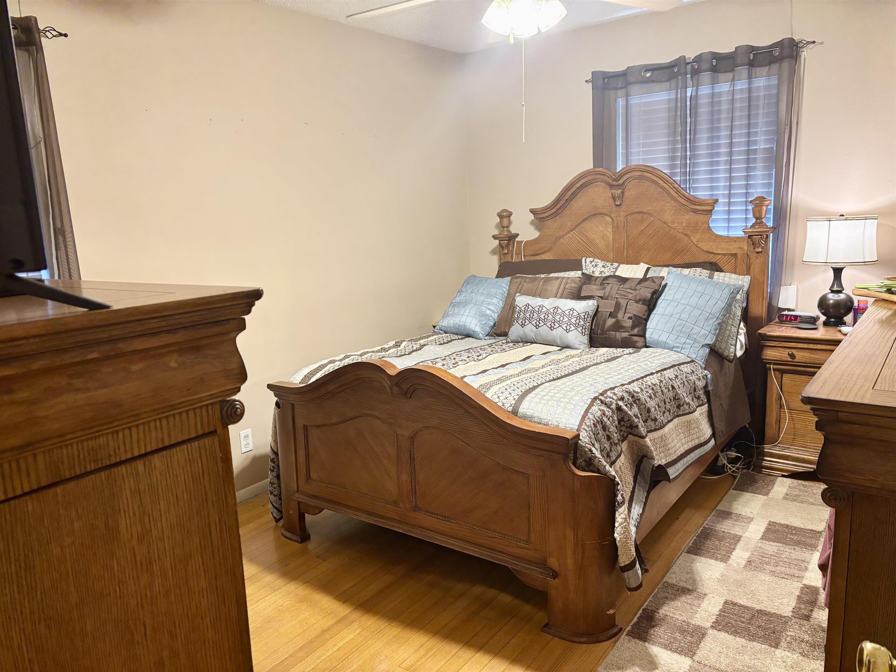 496 Chalmers Road Memphis, TN 38120 - Photo 12 of 20 Bedroom with ceiling fan and light hardwood / wood-style floors